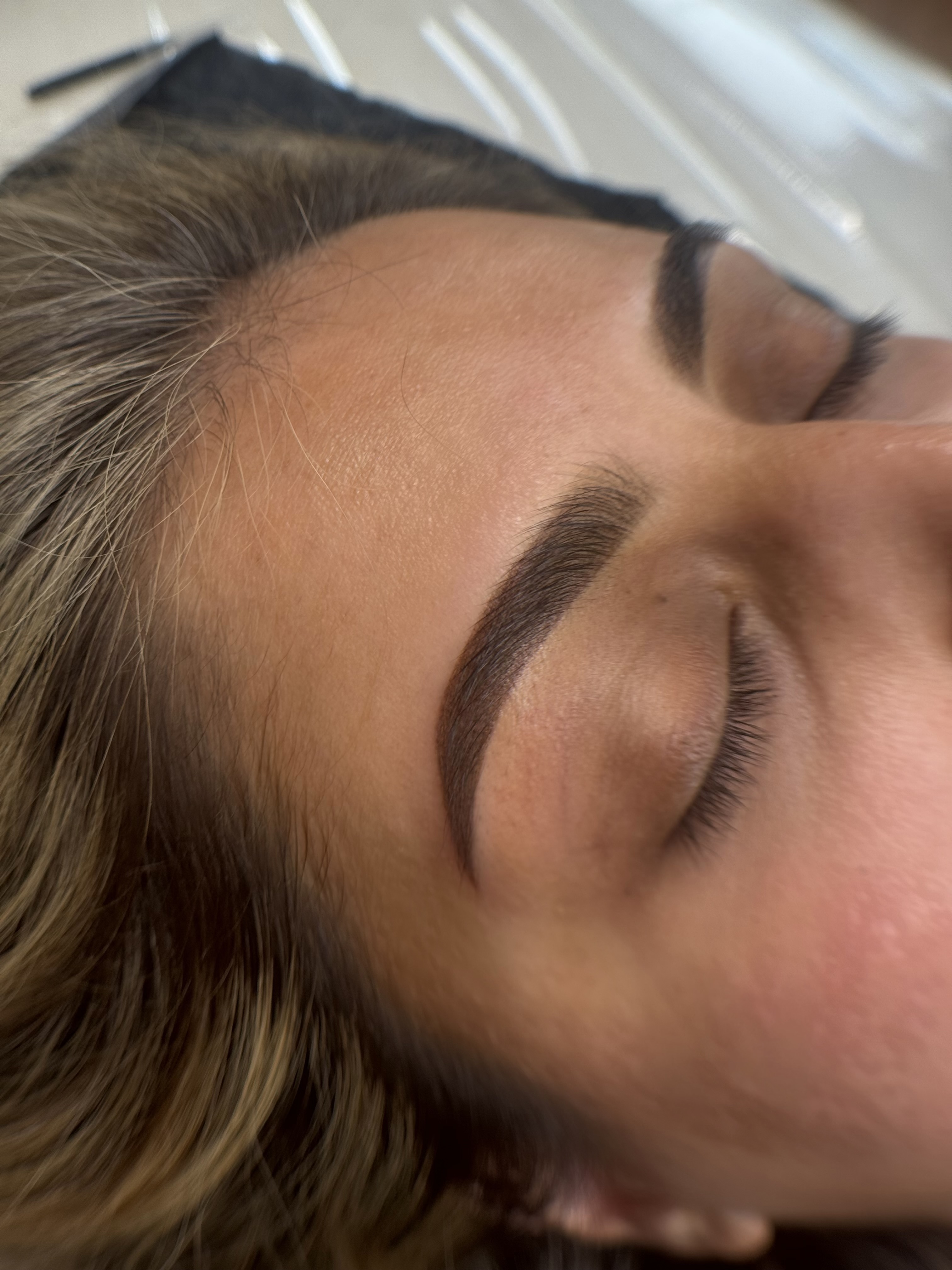 Healed ombre brows with a soft powdered finish
